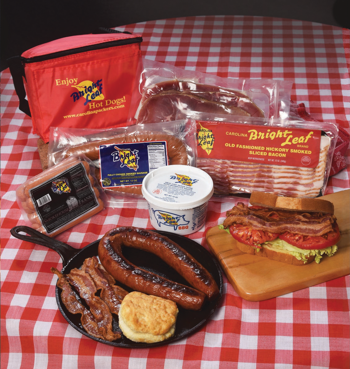 The Bright Leaf Holiday Smokehouse Sampler (1-Smokehouse Franks, 1-Loop Smoked Sausage, 1-Bacon, 1-BBQ, 1-Center Cut Ham Slices